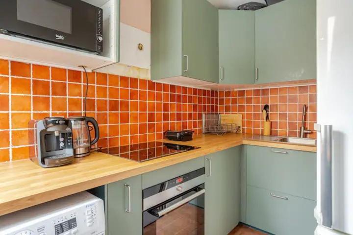 Appartamento Superbe Studio Paris Gambetta Esterno foto